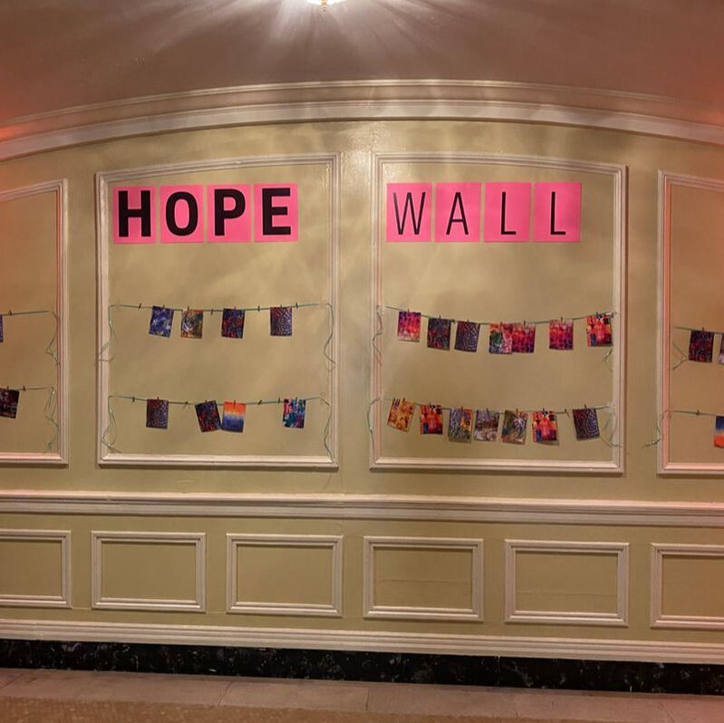 hope wall displaying postcards